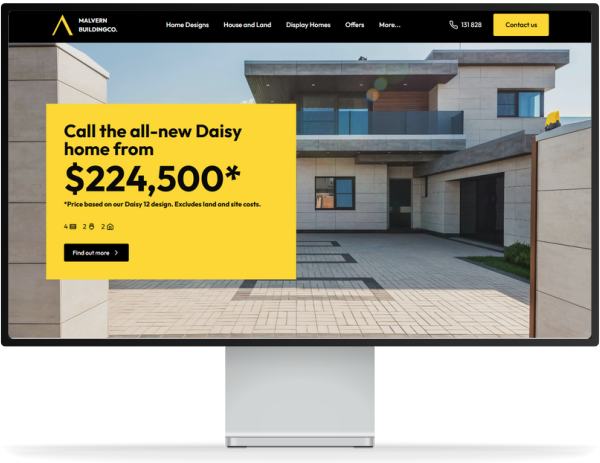 Custom website design displayed on iMac