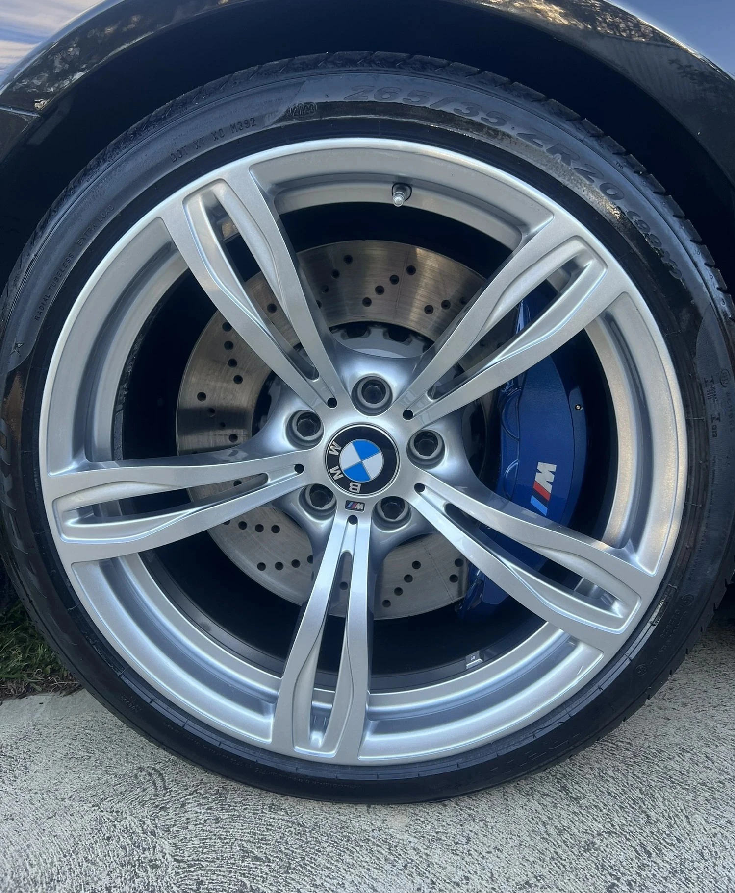 BMW M6 with custom metallic silver finish and caliper refresh